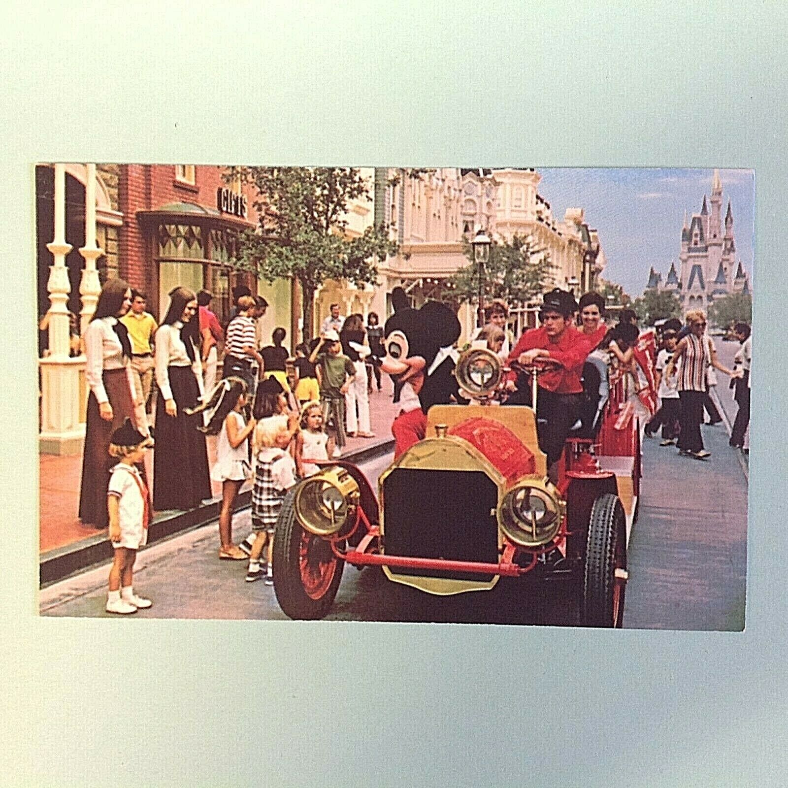 Vintage Walt Disney World Souvenir Color Postcard Riding Down Main Street USA