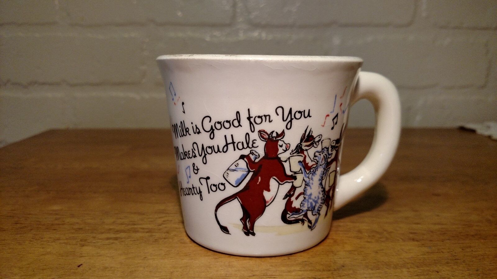 VINTAGE CHILDRENS MILK CUP WITH SINGING,DANCING FARM ANIMALS MARKED USA