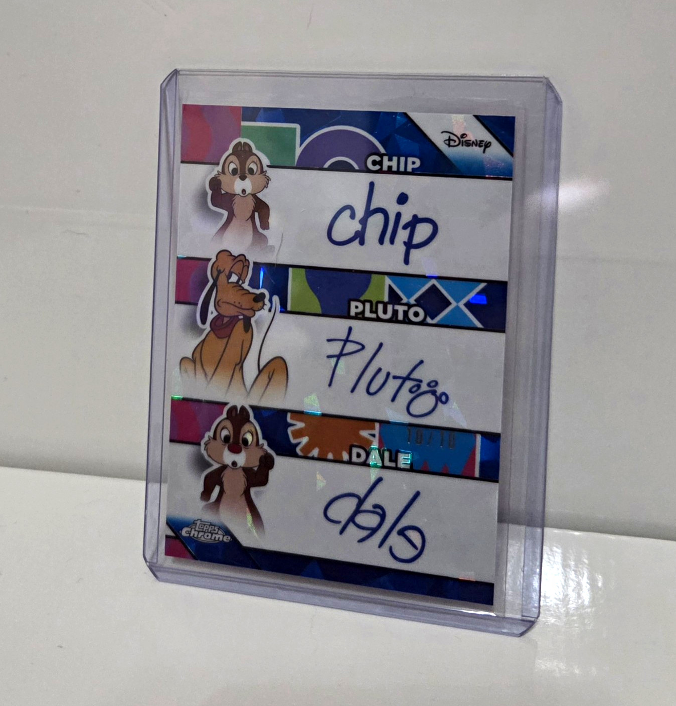 Topps 2026 Disney Sapphire TR-1 Triple Facsimile Auto Chip Pluto Dale 10/10 Topps 2026 Disney Sapphire TR-1 Triple Facsimile Auto Chip Pluto Dale 10/10