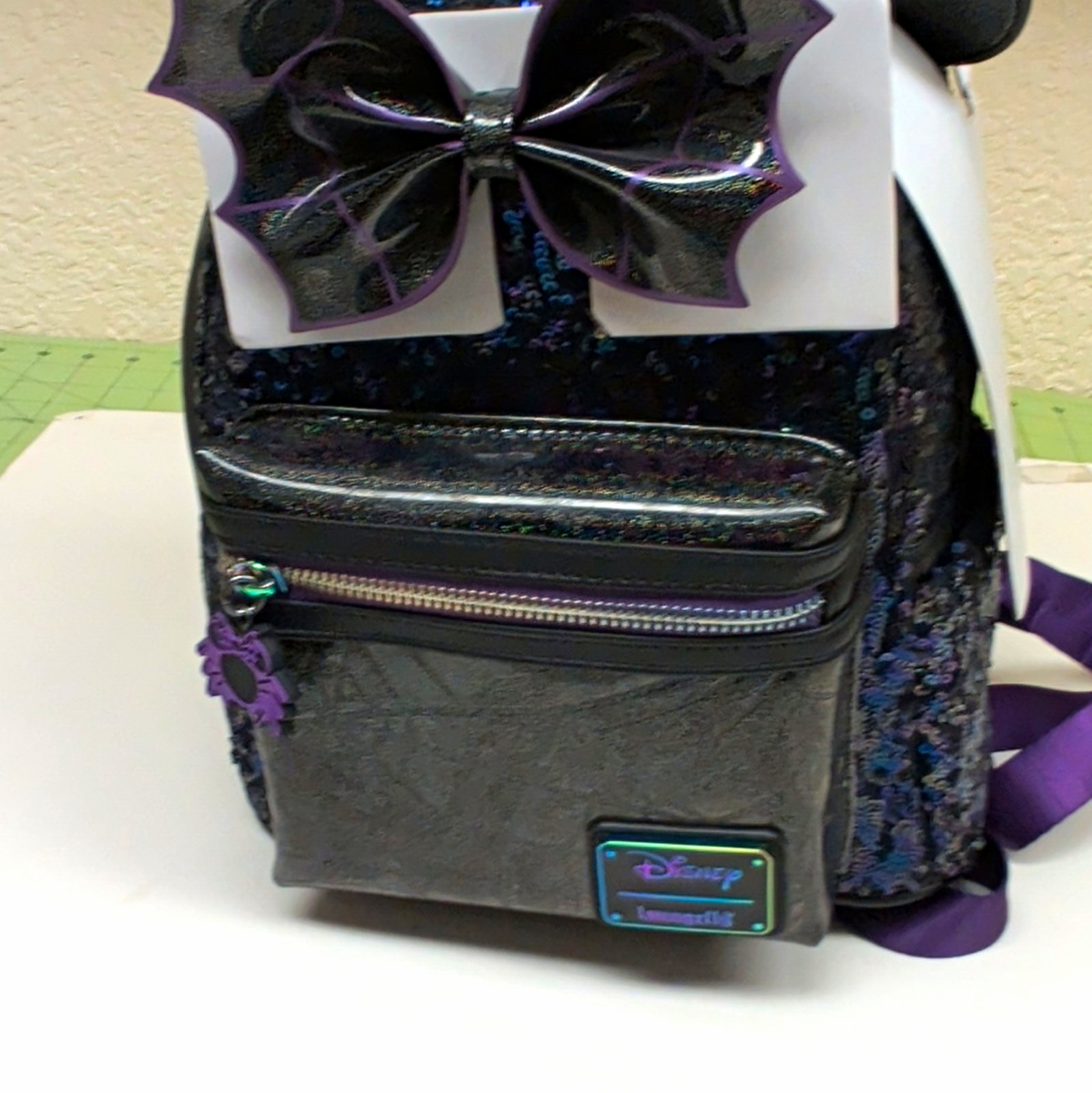 Loungefly Disney Minnie Mouse Sequin Mini Backpack with Ears & Bow Purple/Black Loungefly Disney Minnie Mouse Sequin Mini Backpack with Ears & Bow Purple/Black